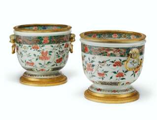 A PAIR OF FRENCH ORMOLU-MOUNTED CHINESE FAMILLE VERTE PORCELAIN CACHE POTS