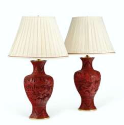 A PAIR OF CHINESE CARVED RED LACQUER BALUSTER VASES MOUNTED AS LAMPS