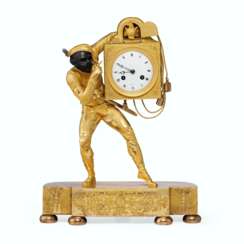 A CHARLES X GILT AND PATINATED BRONZE FIGURAL MANTEL CLOCK