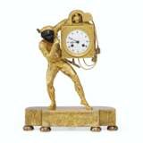 A CHARLES X GILT AND PATINATED BRONZE FIGURAL MANTEL CLOCK - фото 1