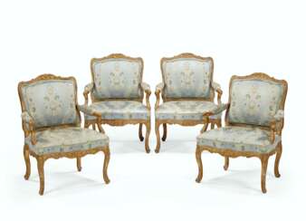 A SET OF FOUR EARLY LOUIS XV GILTWOOD FAUTEUILS