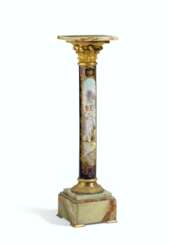 AN ORMOLU AND ONYX MOUNTED COBALT BLUE-GROUND SEVRES STYLE PORCELAIN PEDESTAL