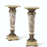 A PAIR OF ORMOLU AND ONYX MOUNTED COBALT-BLUE GROUND SEVRES STYLE PORCELAIN PEDESTALS - фото 1