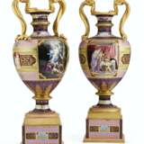 A LARGE PAIR OF VIENNA STYLE PORCELAIN POLYCHROME SNAKE-HANDLED VASES - фото 1