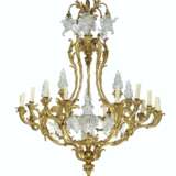 A FRENCH ORMOLU AND MOLDED GLASS THIRTY-ONE-LIGHT CHANDELIER - фото 1