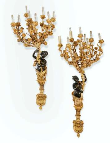 A PAIR OF FRENCH ORMOLU AND PATINATED BRONZE SEVEN-LIGHT WALL APPLIQUES - photo 1