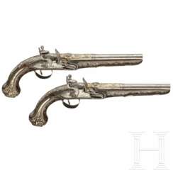 A pair of silver-mounted luxury flintlock pistols, Ottoman, around 1820