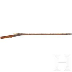 Gold-inlaid matchlock rifle with a painted wooden stock, India, around 1800
