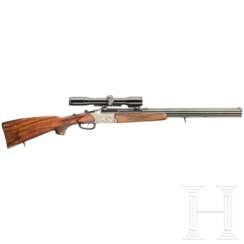 Blaser over and under rifle shotgun with Zeiss scope and barrel