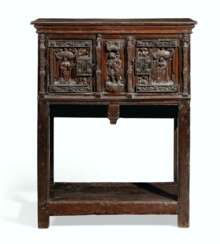 A CARVED WALNUT CABINET 