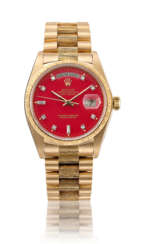 ROLEX, GOLD AND DIAMONDS DAY-DATE WITH RED STELLA DIAL, REF. 18078