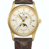 Patek Philippe. PATEK PHILIPPE, GOLD PERPETUAL CALENDAR WITH MOON PHASES AND RETROGRADE DATE, REF. 5050J - Foto 1