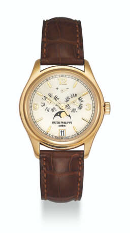 Patek Philippe. PATEK PHILIPPE, GOLD ANNUAL CALENDAR WITH MOON PHASES, REF. 5146J - photo 1