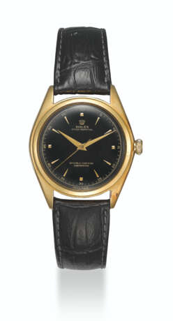 Rolex. ROLEX, GOLD BUBBLE BACK WITH BLACK LACQUERED DIAL, REF. 5028 - фото 1