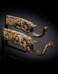 A RARE AND MAGNIFICENT PAIR OF GOLD AND SILVER-INLAID BRONZE...
