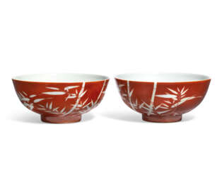 A PAIR OF IRON-RED REVERSE-DECORATED 'BAMBOO' BOWLS