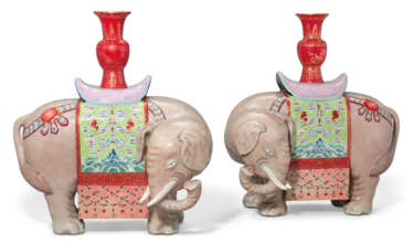 A PAIR OF FAMILLE ROSE 'ELEPHANT AND VASE' CANDLE HOLDERS, T...