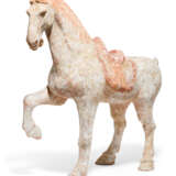 A PAINTED RED POTTERY FIGURE OF A PRANCING HORSE - фото 1