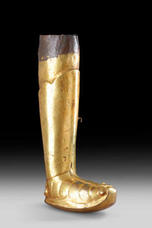 A GILT-BRONZE REPOUSSE LEG OF A BUDDHIST DEITY OR KING - photo 1