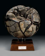 Septaire. A SEPTARIAN SPHERE WITH CRYSTAL CAVITY