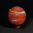 A LARGE RED JASPER SPHERE - Auction prices