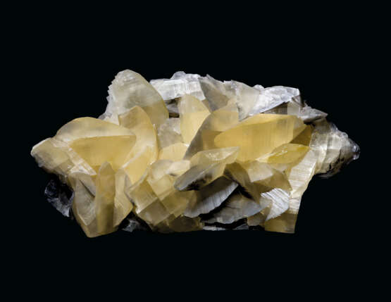 A CLUSTER OF LARGE YELLOW CALCITE CRYSTALS - photo 1