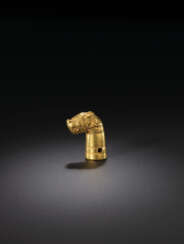 A RARE AND IMPORTANT GOLD 'FELINE-HEAD' FINIAL