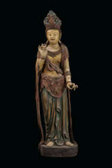 A PAINTED WOOD FIGURE OF A STANDING GUANYIN