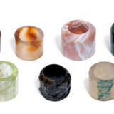 A GROUP OF SEVEN AGATE AND HARDSTONE ARCHER'S RINGS - photo 2