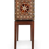 A SPANISH COLONIAL BRASS-MOUNTED AND EBONY, BONE AND TORTOISESHELL-INLAID CABINET-ON-STAND - photo 26