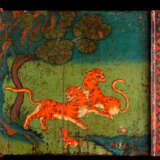 A PAIR OF POLYCHROME-PAINTED SHRINE DOORS WITH A MAHASIDDHA AND A PAIR OF TIGERS - photo 1