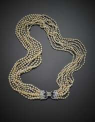 Eight strand natural saltwater pearl necklace with white gold diamond in all ct. 3 circa and pear sapphire clasp
