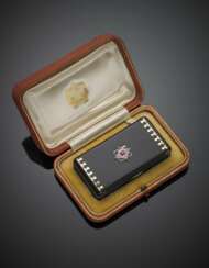 CARTIER | Silver and gold alloy and black enamel box on the cover an enamel flower and small diamonds