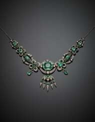Old mine diamond and variously cut emerald silver and 9K gold devant de corsage