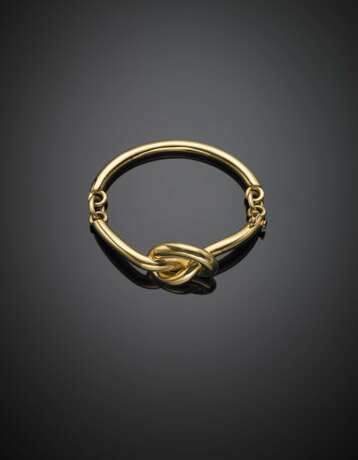 Yellow gold articulated knot bracelet - photo 1