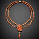 Two strand pink orangish coral bead necklace with carved coral cameo central and drop pendant - фото 1