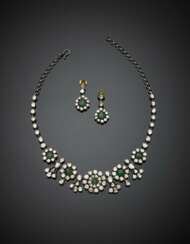 Silver and yellow chiselled gold jewelry set comprising necklace and pendant earrings with irregular diamonds and green back foiled doublet stones