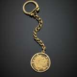 Yellow gold key ring with 20 Franc belgian coin - photo 1