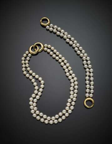 Yellow gold and cultured pearl jewellery set comprising cm 39 circa necklace and cm 21.80 circa bracelet - фото 1