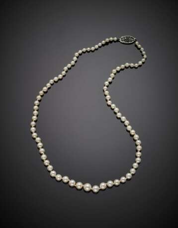 Cultured pearl graduated necklace with white gold green gem clasp - photo 1