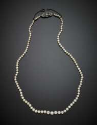 Graduated cultured pearl necklace with white gold diamond clasp