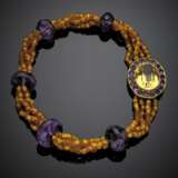 Four strand yellow paste necklace with great faceted amethyst bead spacers - photo 1