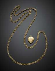 Yellow gold lot comprising a textured chain and a heart shape pendant accented with one diamond