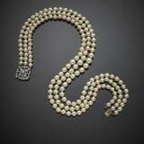 Three strand graduated cultured pearl necklace with white gold diamond clasp - photo 1