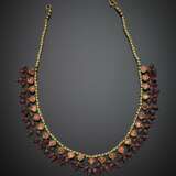 Yellow gold necklace with pink foiled cabochon stones and pendant spinel beads - фото 1