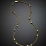 Long yellow gold double chain with cultured pearl spacers - photo 1