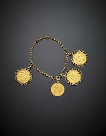 Yellow gold chain bracelet with three coin and one medal as charms - фото 1