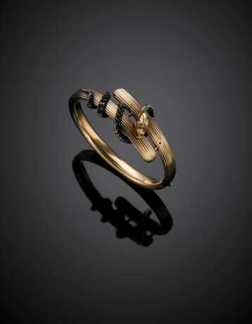 Yellow gold grooved bangle with snake accented in silver - Foto 1