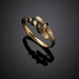 Yellow gold grooved bangle with snake accented in silver - photo 1