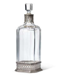 A SILVER-MOUNTED CUT-GLASS DECANTER